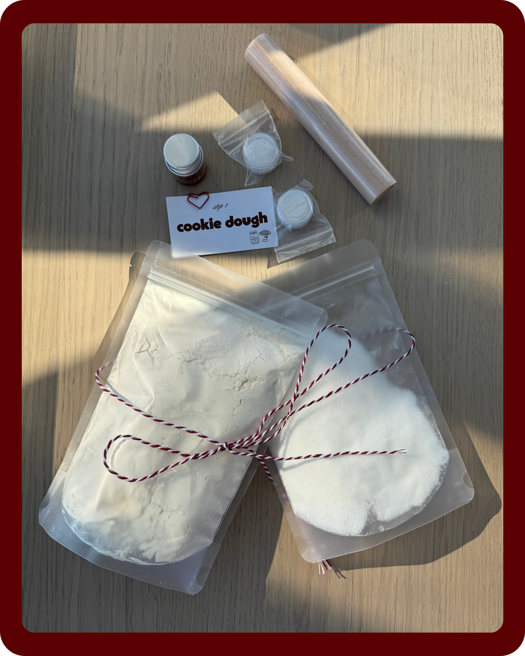 Canvas print of a character in a black outfit with a yellow 'X' on a textured red background.